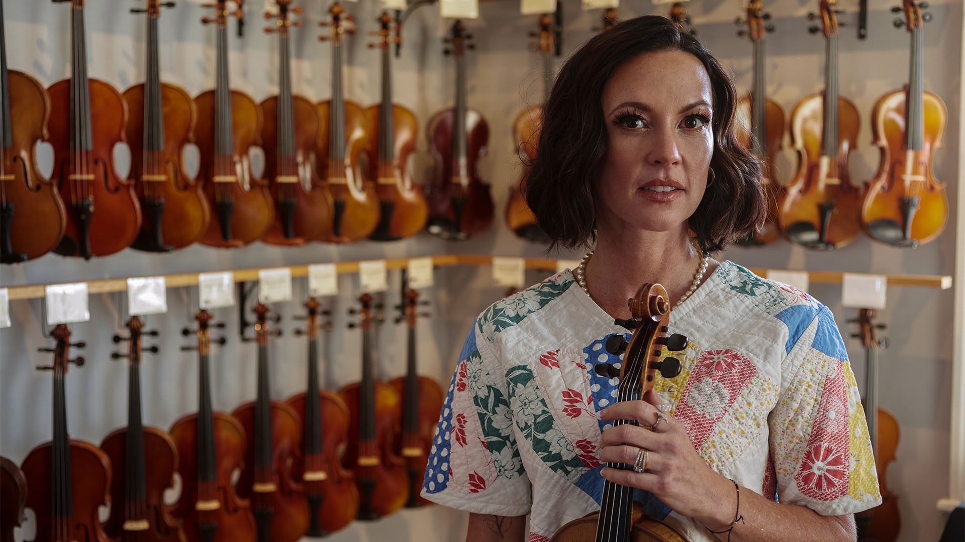 Amanda Shires with a fiddle at The Violin Shop in Nashville, Tennessee.