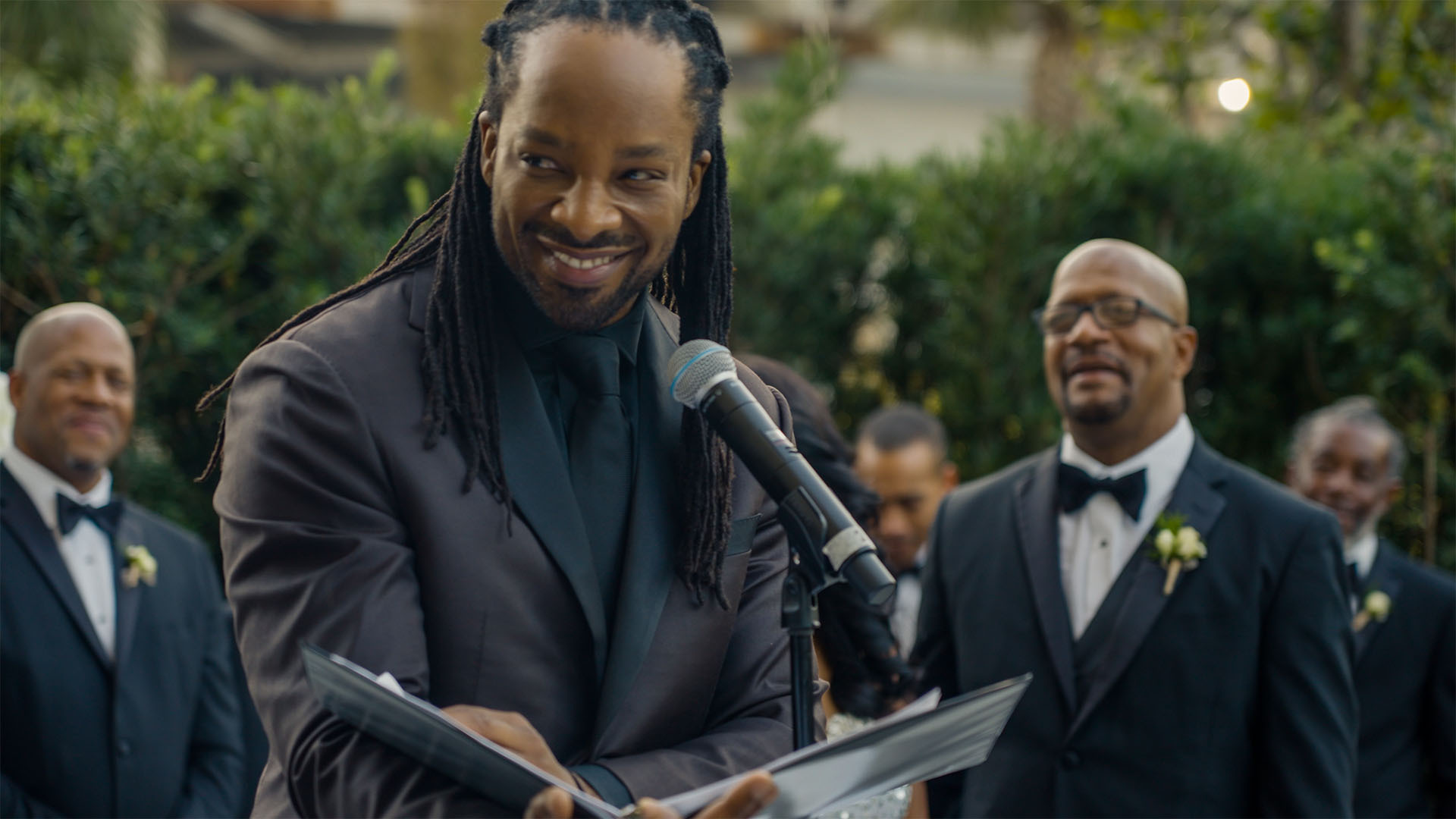 Jericho Brown speaking at his cousin's wedding.