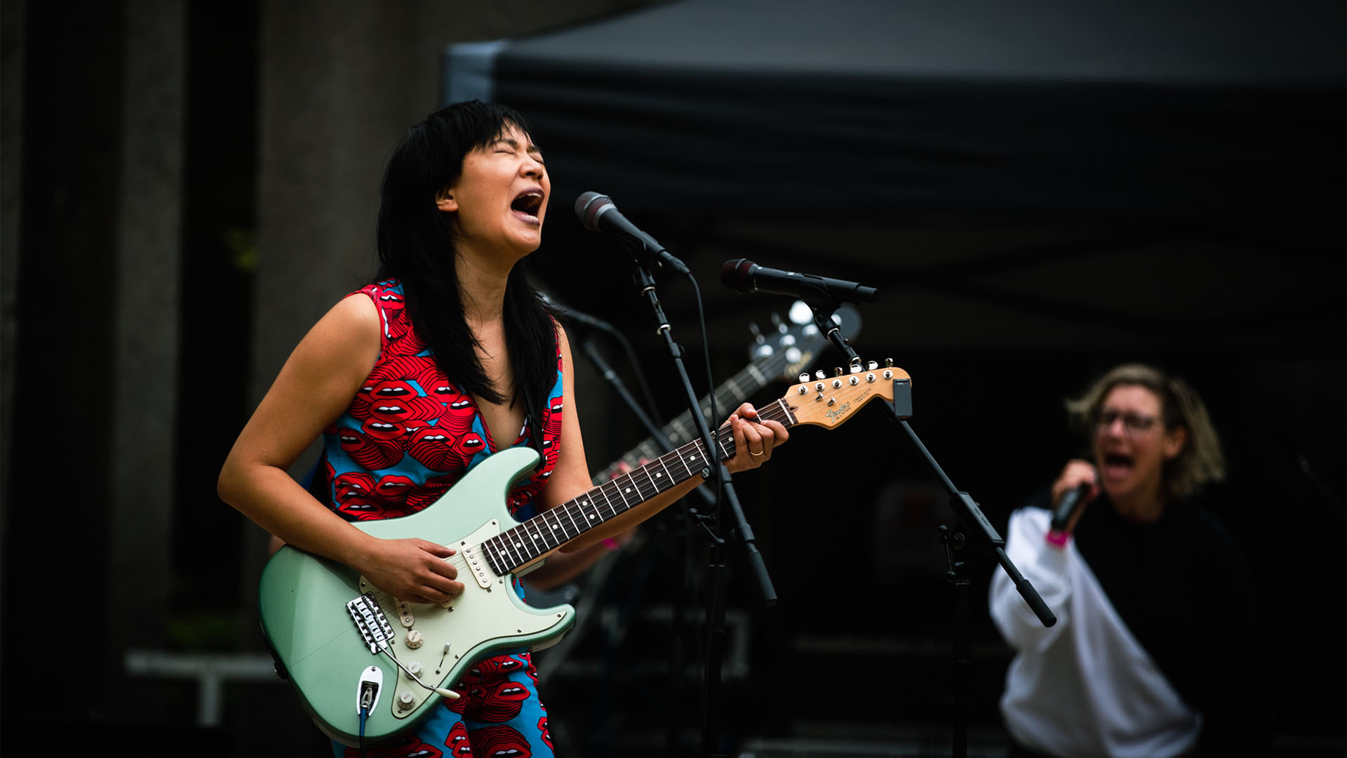 Thao Nguyen sings and plays guitar while performing at Due South in San Francisco, California.