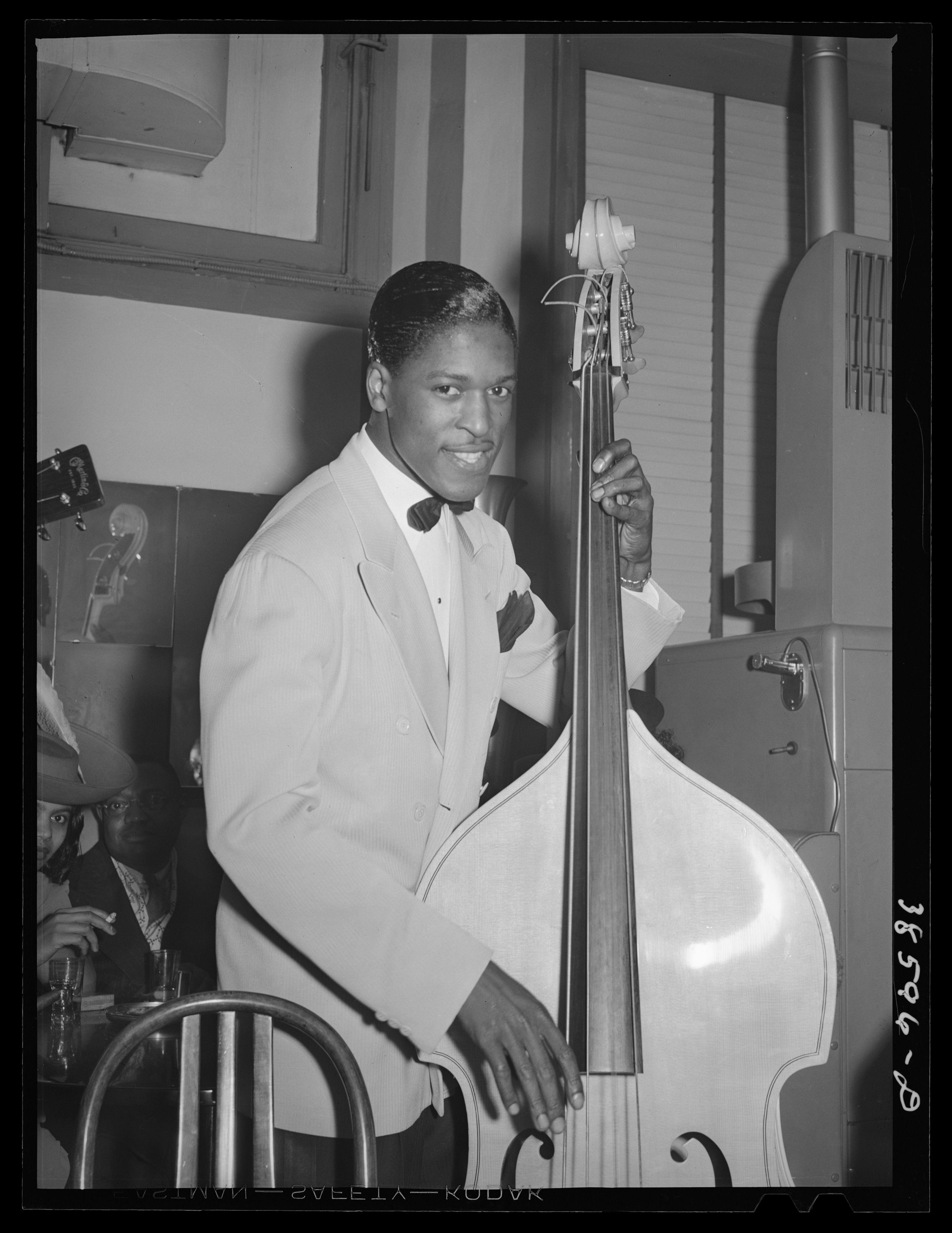 Musician at tavern on the Southside of Chicago. Bronzeville Black nightlife.